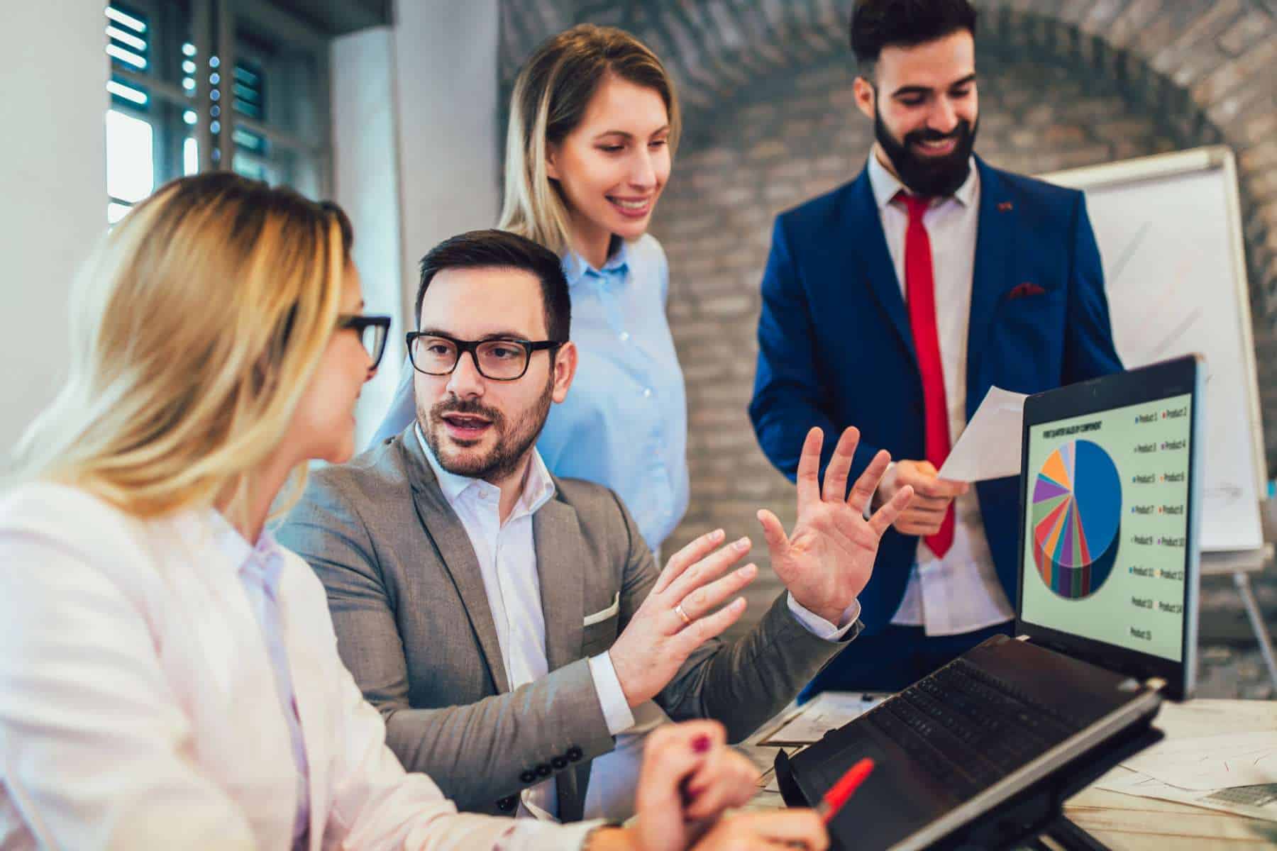 actuaries working together highlighting the importance of actuarial communication skills